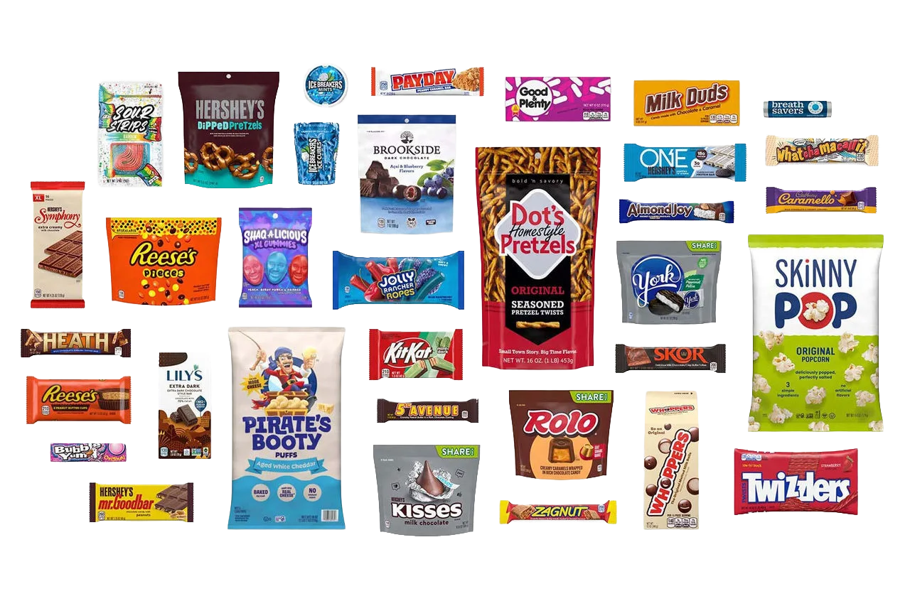A spread of The Hershey Company product packaging, including Reese's, Hershey's, Kit Kat, Twizzlers, Skinny Pop and Pirate's Booty